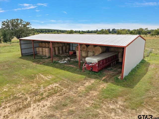 a terrace of a house with outdoor seating