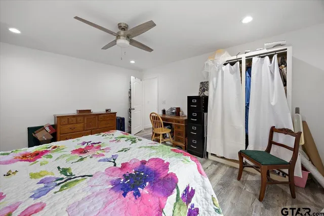 a bed room with a bed and a window