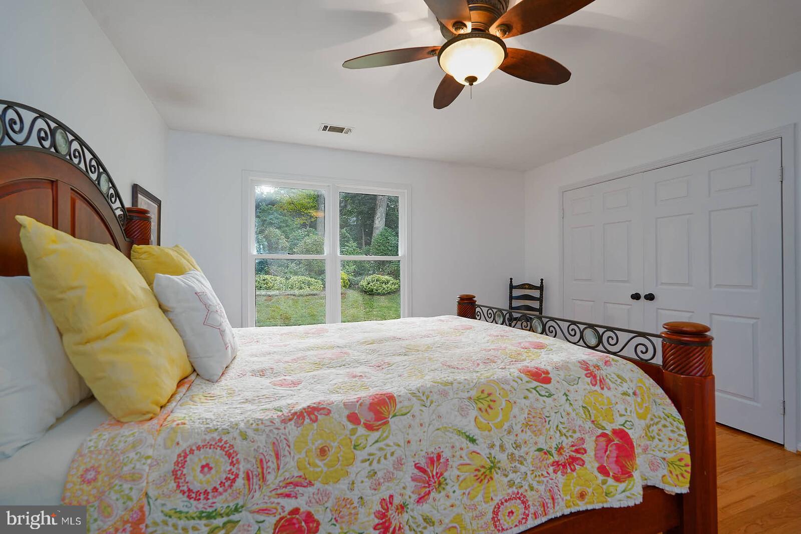 9505 Columbia Boulevard Silver Spring, MD 20910 - Photo 27 of 55 a bedroom with a bed and a window