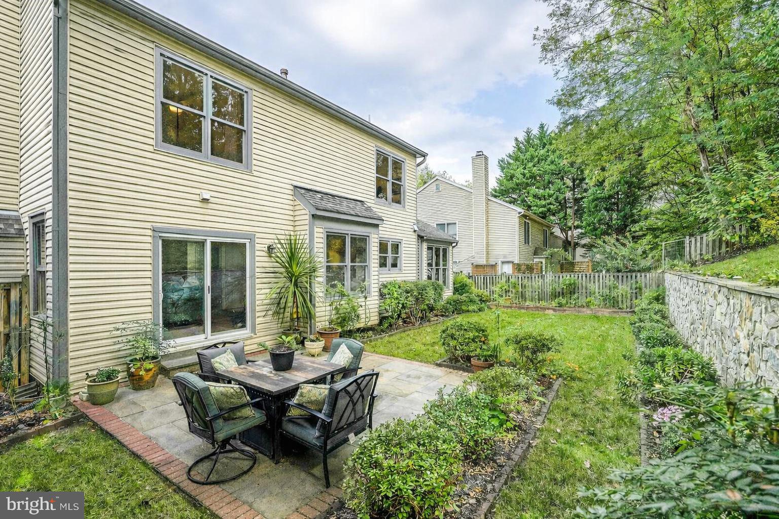 9505 Columbia Boulevard Silver Spring, MD 20910 - Photo 38 of 55 a backyard of a house with table and chairs