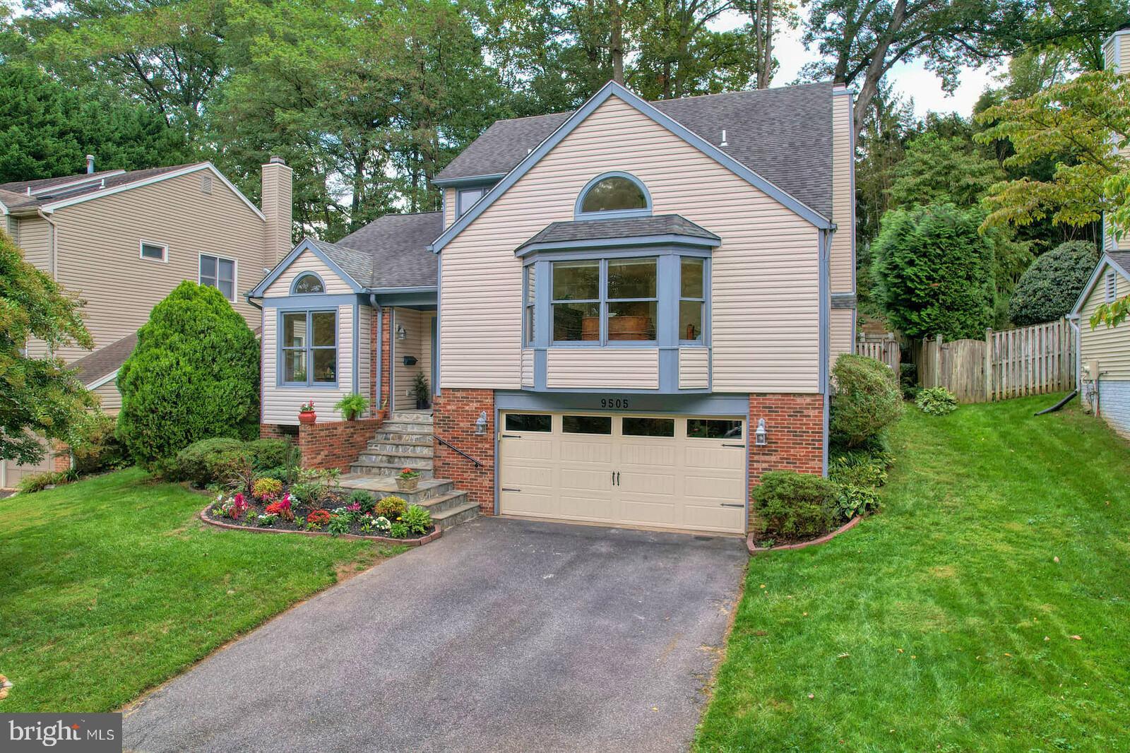 9505 Columbia Boulevard Silver Spring, MD 20910 - Photo 49 of 55 a front view of a house with a yard