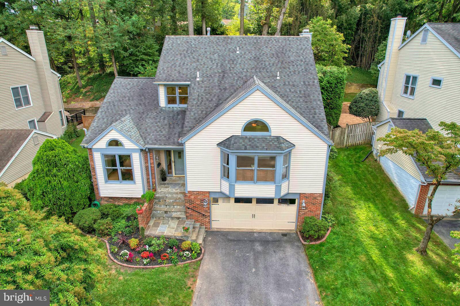9505 Columbia Boulevard Silver Spring, MD 20910 - Photo 50 of 55 a front view of a house with a yard