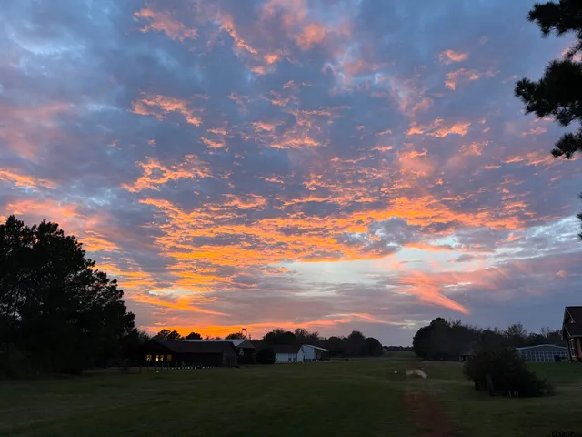 a view of a swimming pool with a lake view