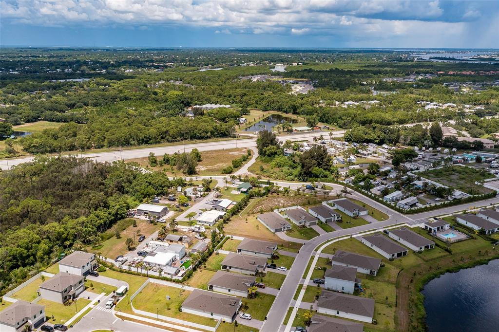 5754 Southeast Green Lane Stuart, FL 34997 - Photo 8 of 16 an aerial view of residential building with outdoor space