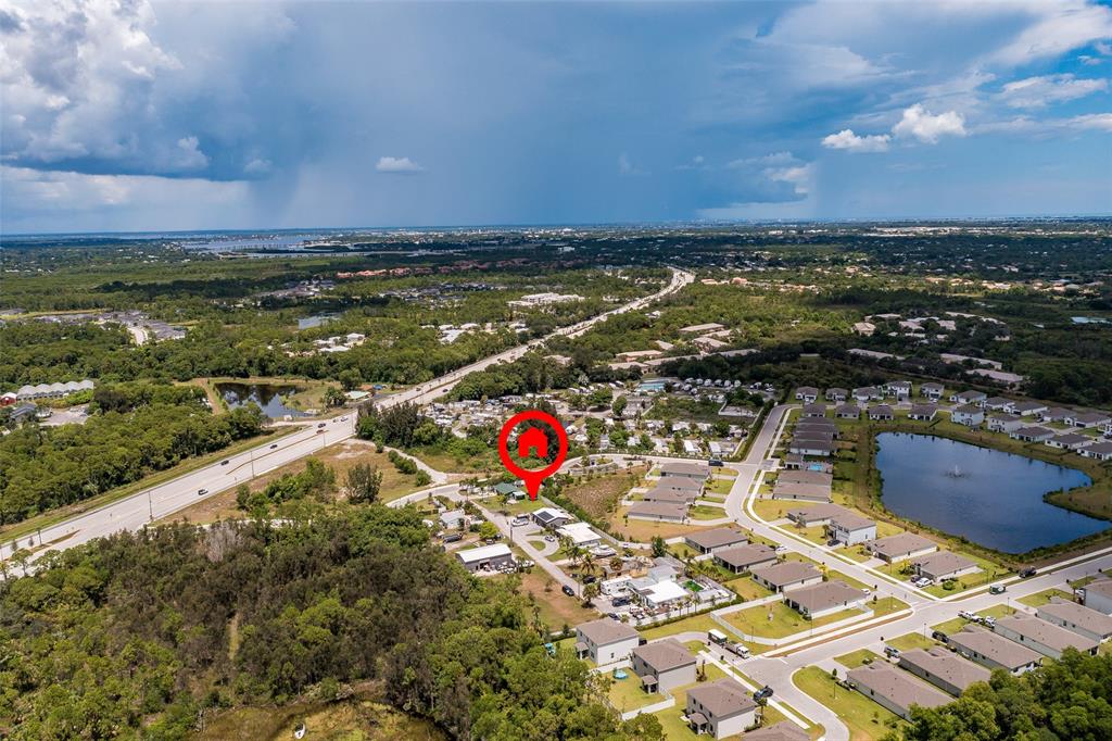 5754 Southeast Green Lane Stuart, FL 34997 - Photo 10 of 16 a view of a city and an ocean view