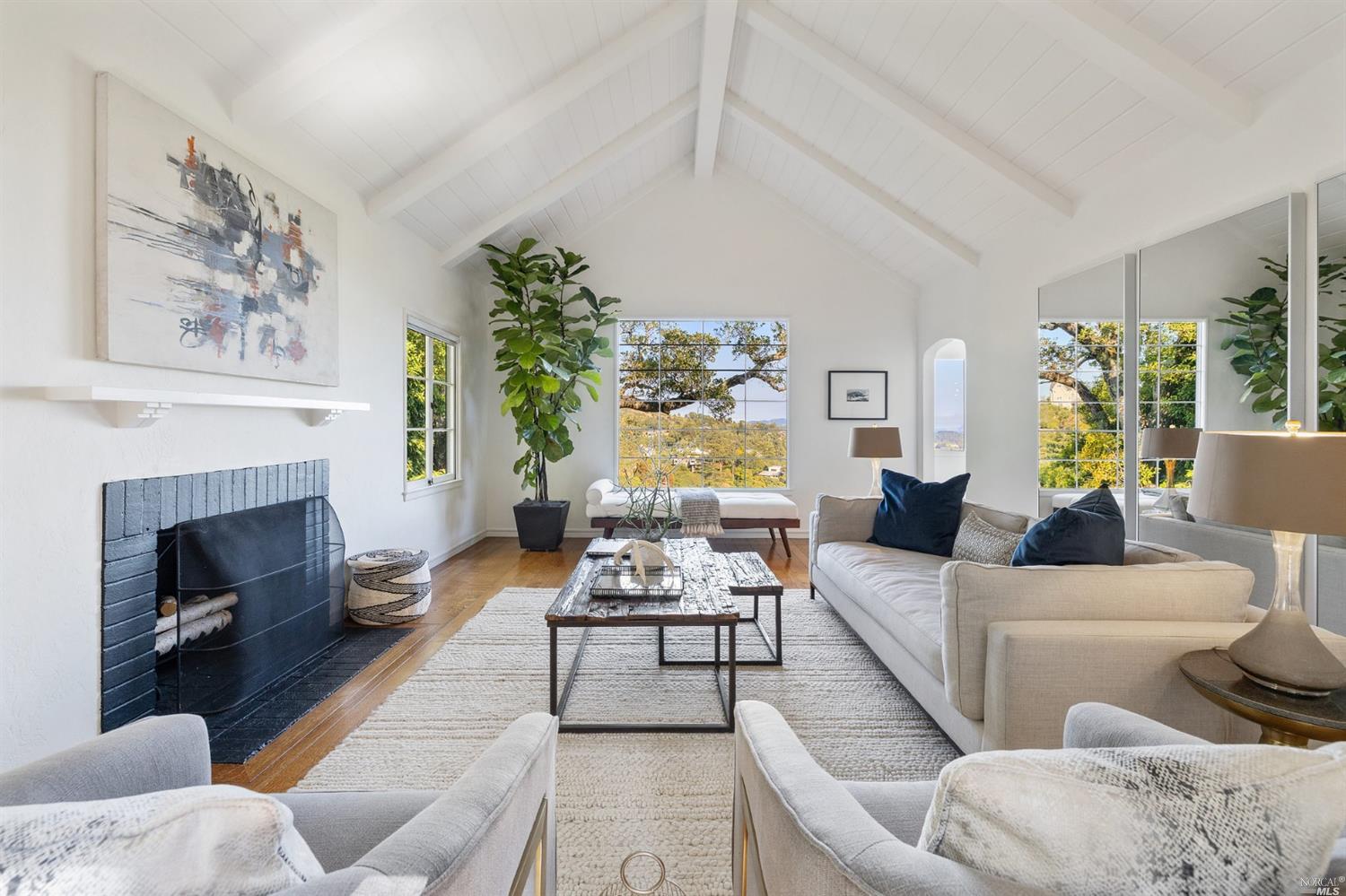 266 Hillside Avenue Mill Valley, CA 94941 - Photo 1 of 1 a living room with furniture and a fireplace