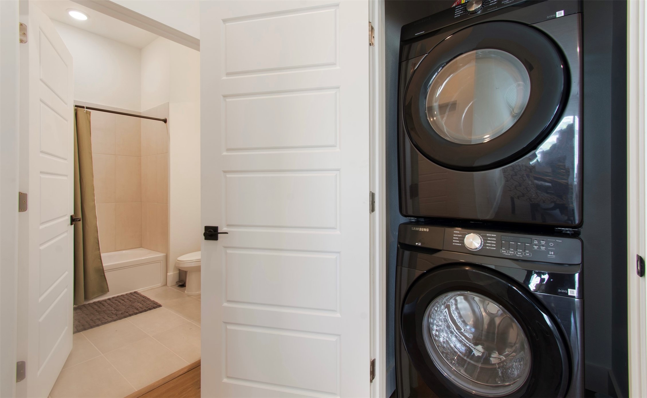 1811 Webberville Road, Unit 1305 Austin, TX 78721 - Photo 13 of 15 a close view of a utility room with dryer and washer