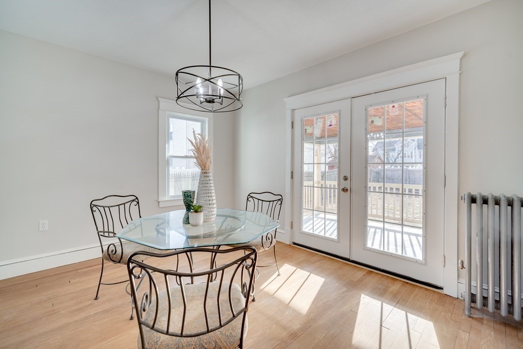 14 Leroy Place Springfield, MA 01104 - Photo 1 of 40 a view of a dining room with furniture window and wooden floor