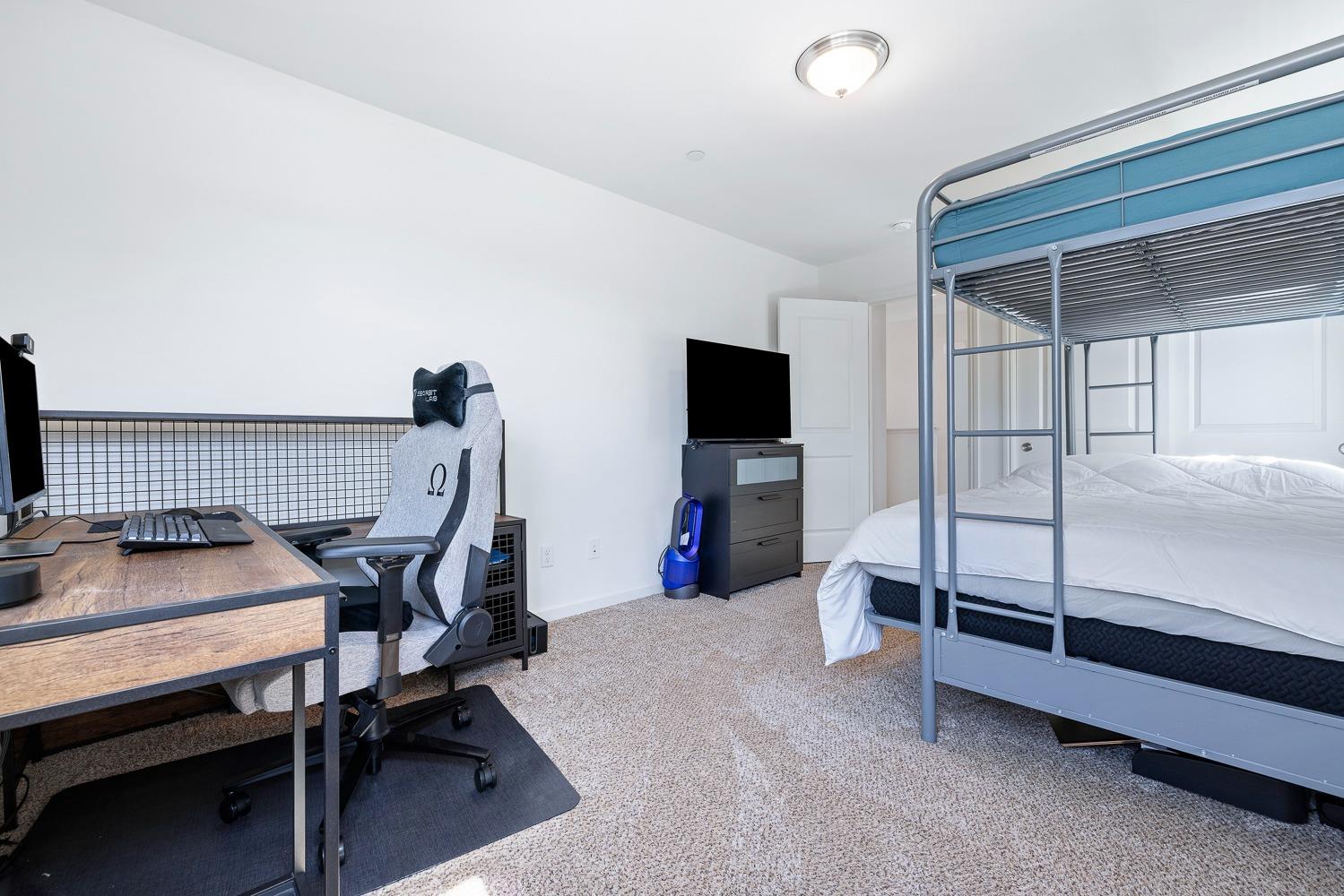 3606 Parkstone Way Clovis, CA 93619 - Photo 18 of 38 a bedroom with furniture and a window