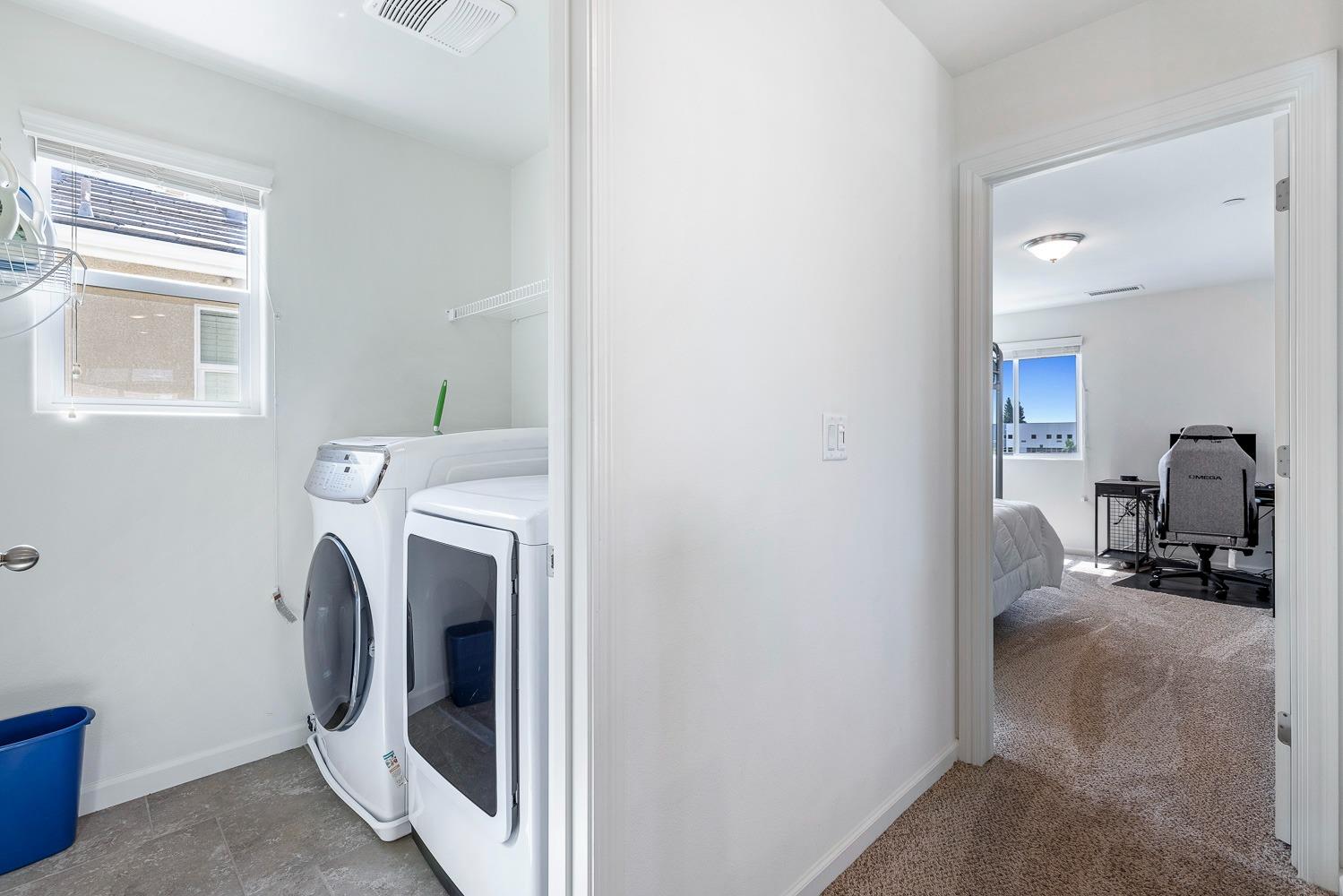 3606 Parkstone Way Clovis, CA 93619 - Photo 19 of 38 a utility room with dryer and washer