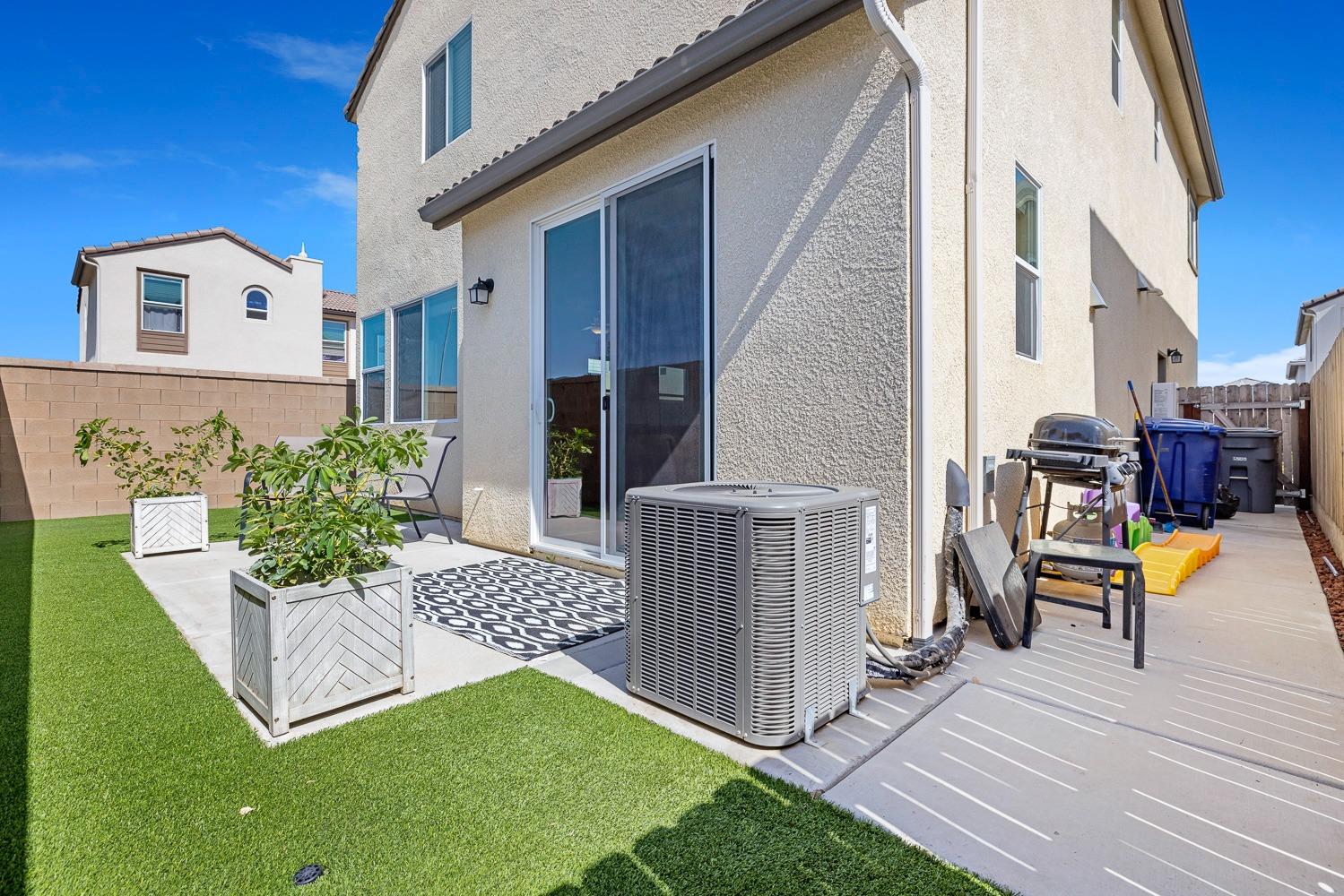 3606 Parkstone Way Clovis, CA 93619 - Photo 32 of 38 a view of a house with backyard and sitting area