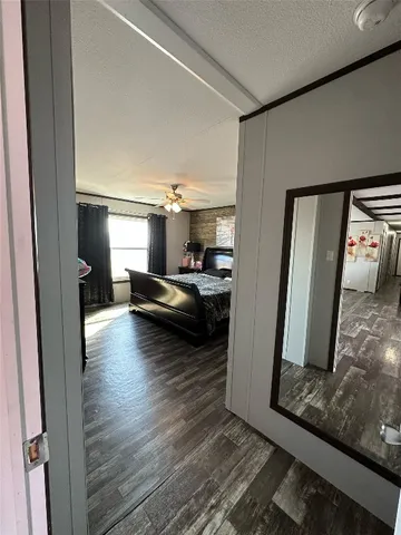 a view of a living room and hardwood floor