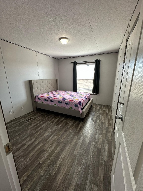 3278 County Road 417 Thorndale, TX 76577 - Photo 14 of 24 a bedroom with a bed and window