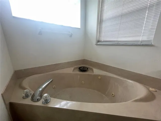 closeup view of a bathtub in a window