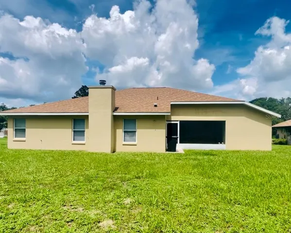 a house view with a garden space