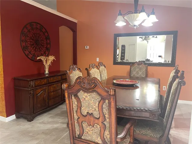 a view of a dining room with furniture