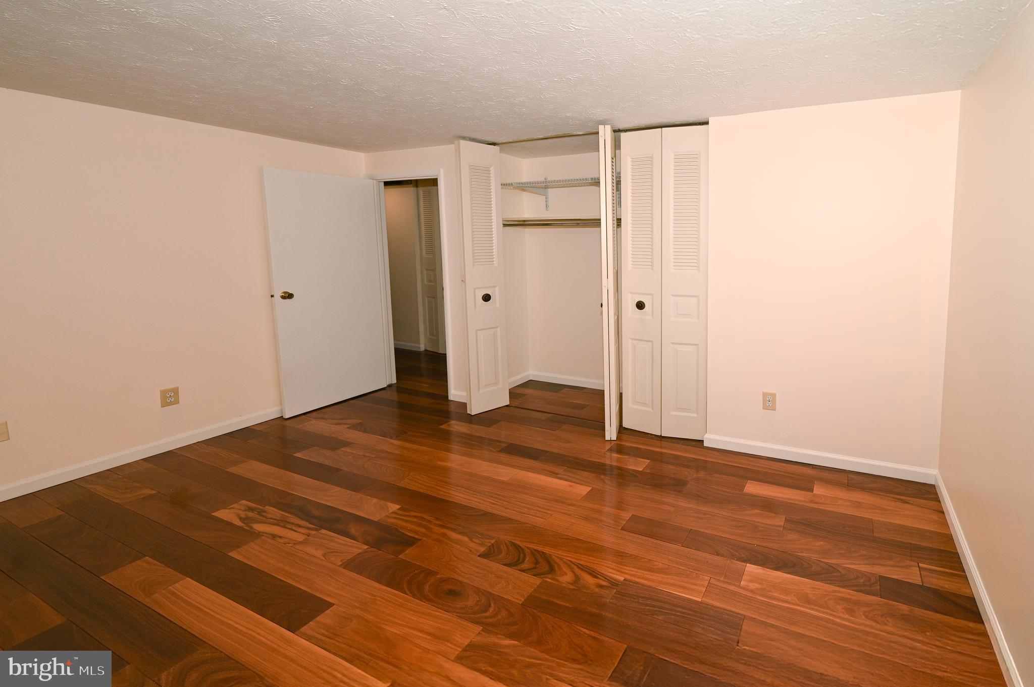8110 Winter Blue Court Springfield, VA 22153 - Photo 10 of 24 a view of a room with wooden floor