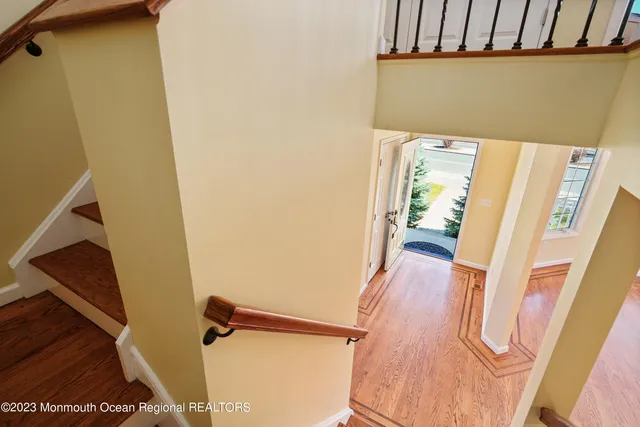 a view of entryway with wooden floor