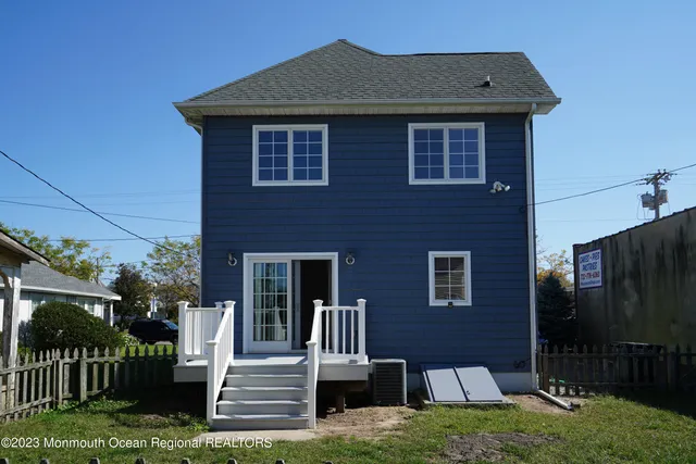 a front view of a house with a porch