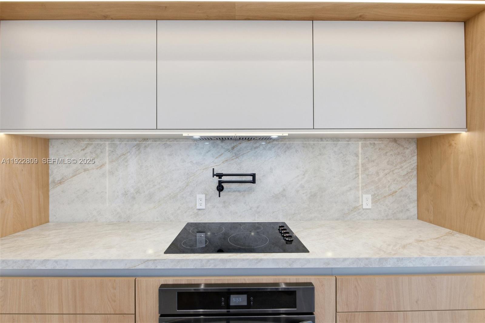 3111 Southwest 12th Street, Unit A Miami, FL 33135 - Photo 12 of 35 a kitchen with a sink and cabinets