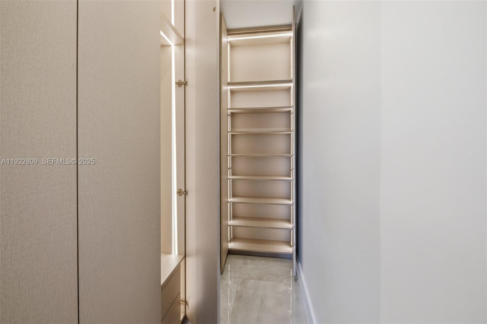 3111 Southwest 12th Street, Unit A Miami, FL 33135 - Photo 24 of 35 a view of walk in closet with empty racks