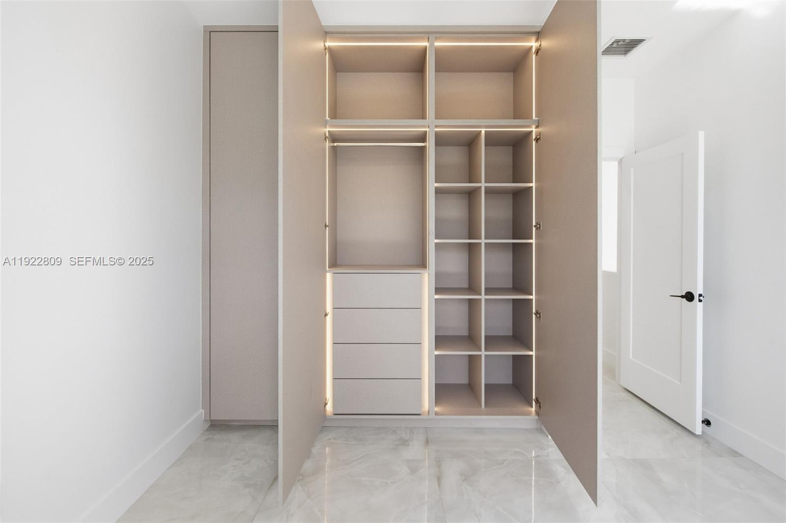 3111 Southwest 12th Street, Unit A Miami, FL 33135 - Photo 28 of 35 a view of an empty room with a closet