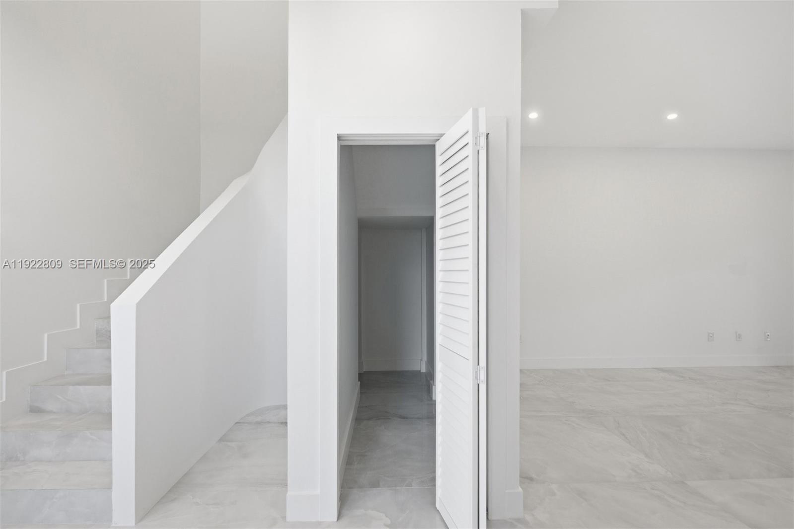 3111 Southwest 12th Street, Unit A Miami, FL 33135 - Photo 30 of 35 a view of a hallway with hallway