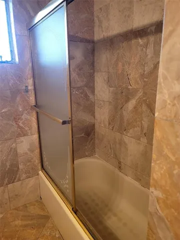 a bathroom with a bathtub