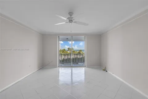 a view of empty room with floor to ceiling window