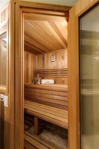 a backyard of a house with yard swimming pool and outdoor seating