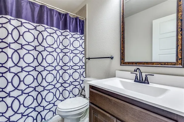 a bathroom with a sink and a toilet