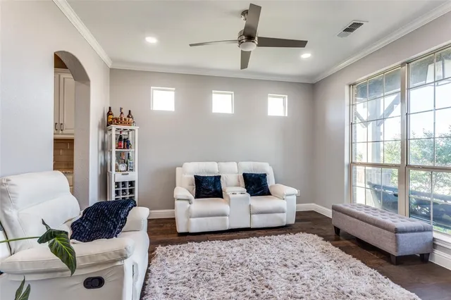 a living room with furniture and a couch