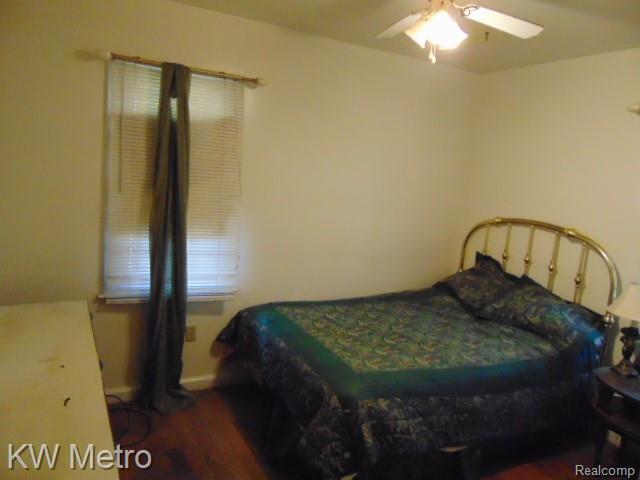 20495 Meyers Road Detroit, MI 48235 - Photo 3 of 7 Bedroom with dark wood-style floors and ceiling fan