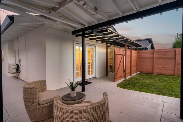 a view of a backyard of the house