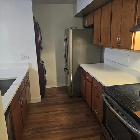 a close up view of a washer and dryer in a bathroom