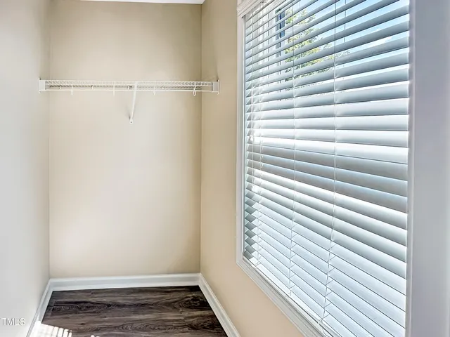 a view of a room with racks on the wall
