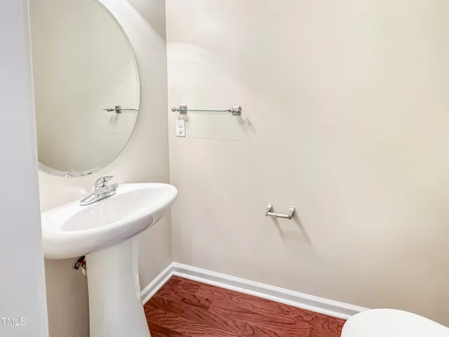 a bathroom with a sink a toilet