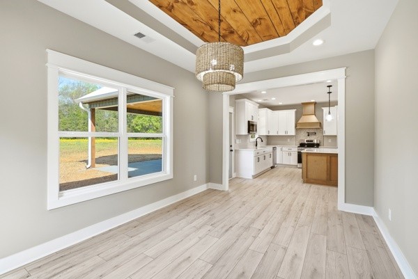 1180 Belfast Farmington Road Lewisburg, TN 37091 - Photo 20 of 41 a view of a kitchen with a sink and wooden floor
