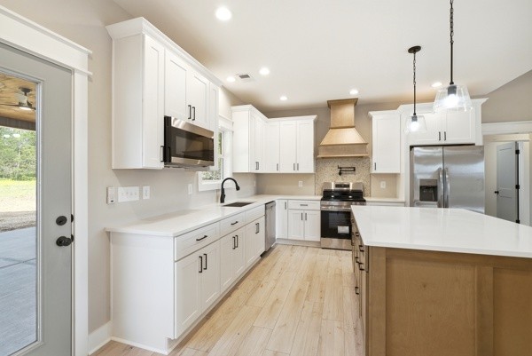 1180 Belfast Farmington Road Lewisburg, TN 37091 - Photo 23 of 41 a kitchen with stainless steel appliances kitchen island granite countertop a sink a stove and a refrigerator