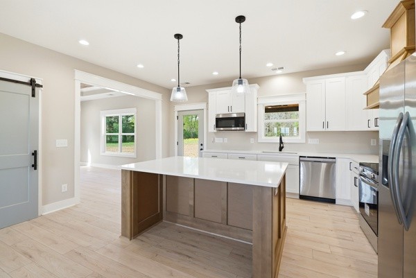 1180 Belfast Farmington Road Lewisburg, TN 37091 - Photo 25 of 41 a kitchen with a sink stove and refrigerator