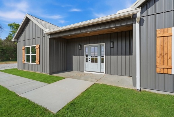 1180 Belfast Farmington Road Lewisburg, TN 37091 - Photo 3 of 41 a front view of a house with a yard and garage