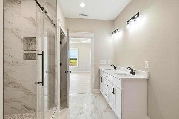 1180 Belfast Farmington Road Lewisburg, TN 37091 - Photo 32 of 41 a bathroom with a double vanity sink and mirror