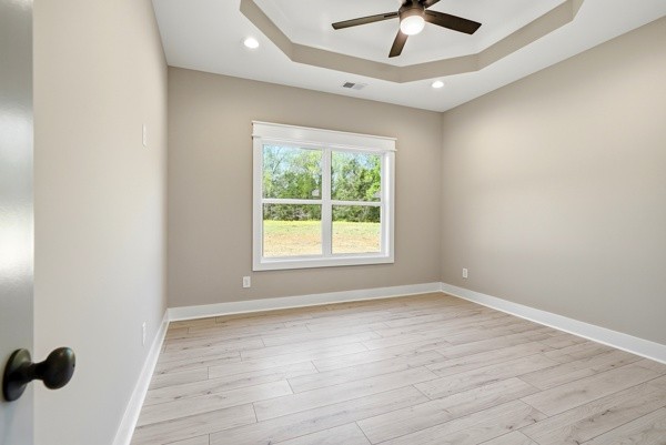 1180 Belfast Farmington Road Lewisburg, TN 37091 - Photo 33 of 41 wooden floor in an empty room with a window