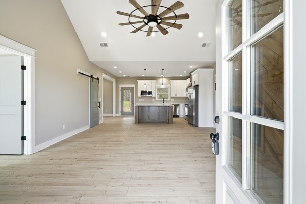 1180 Belfast Farmington Road Lewisburg, TN 37091 - Photo 10 of 41 a view of a kitchen with a sink and a refrigerator