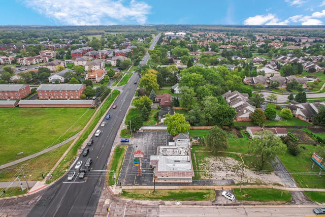a view of a city with a lake
