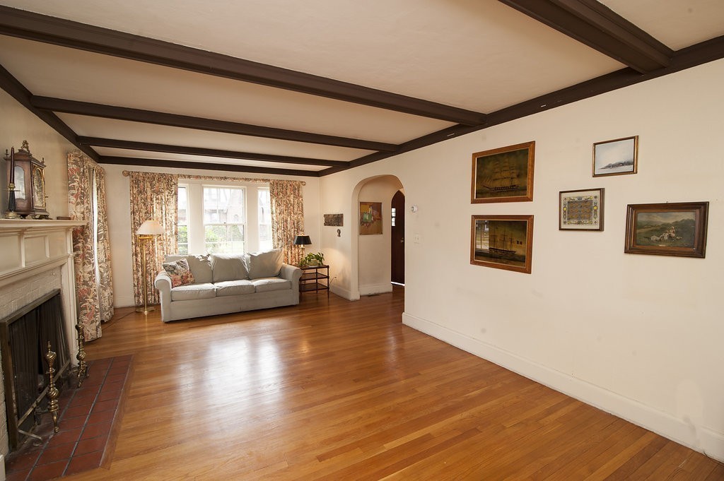 3 Rangeley Road Newton, MA 02465 - Photo 6 of 20 a living room with furniture and a fireplace