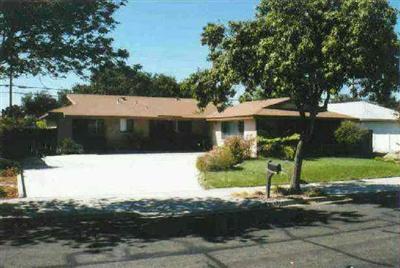 4046 Rigel Avenue Lompoc, CA 93436 - Photo 1 of 1 a front view of a house with a yard