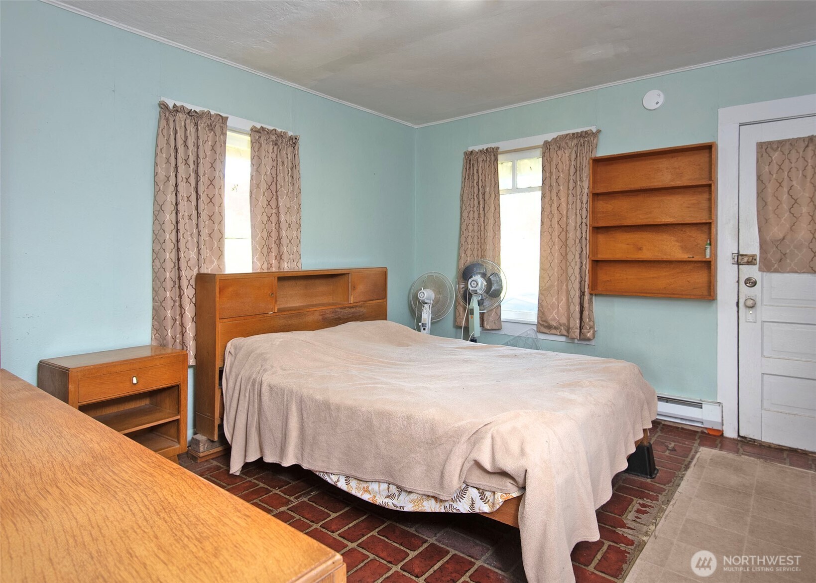705 South 208th Street Des Moines, WA 98198 - Photo 15 of 20 a bedroom with a bed and window