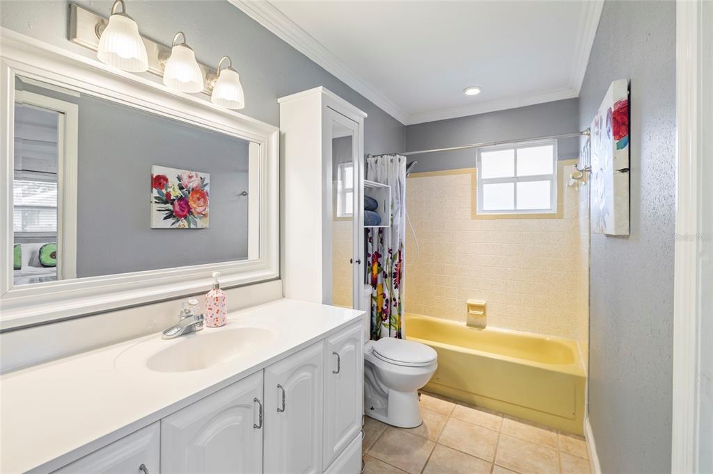 5031 Lakewood Road Sebring, FL 33875 - Photo 31 of 77 a bathroom with a sink a toilet and a bathtub