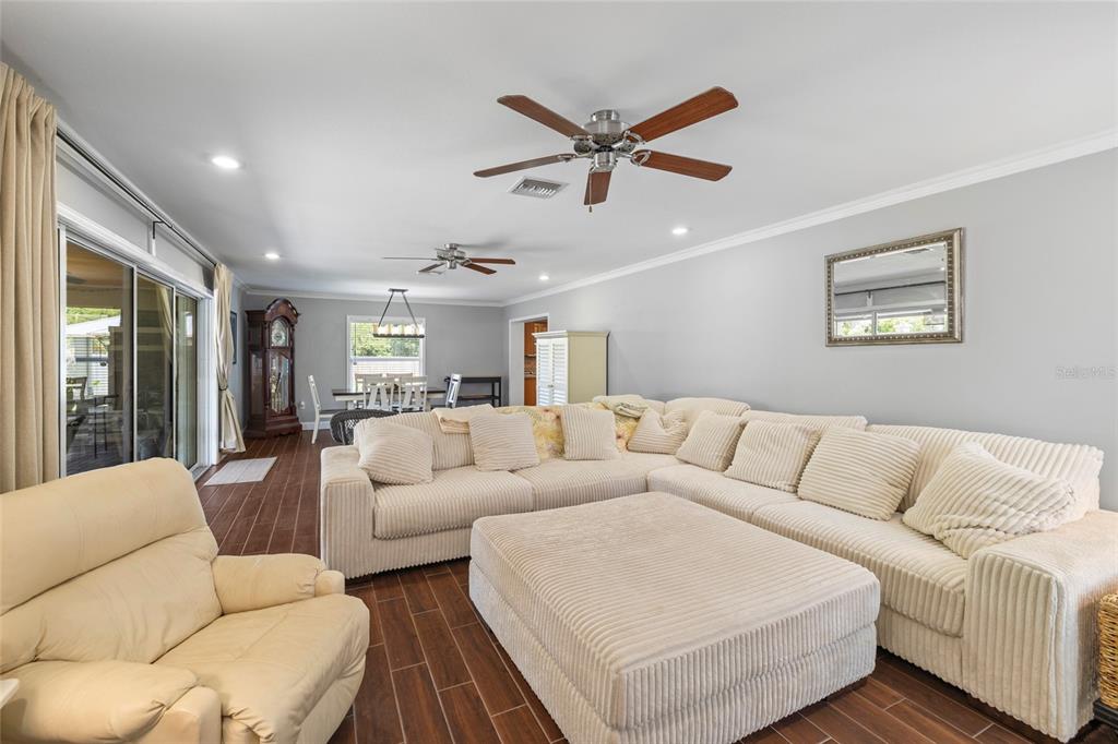 5031 Lakewood Road Sebring, FL 33875 - Photo 42 of 77 a living room with furniture and a large window